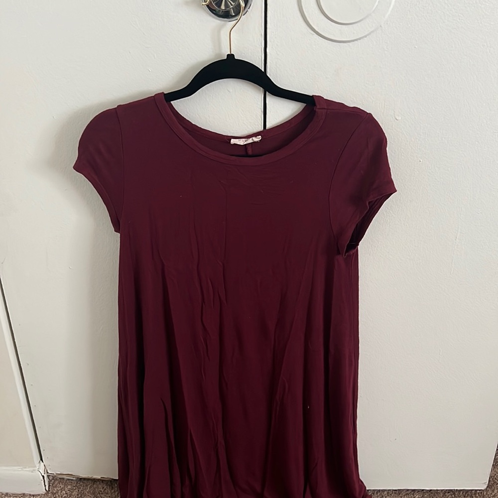 Maroon short sleeve knee length dress.